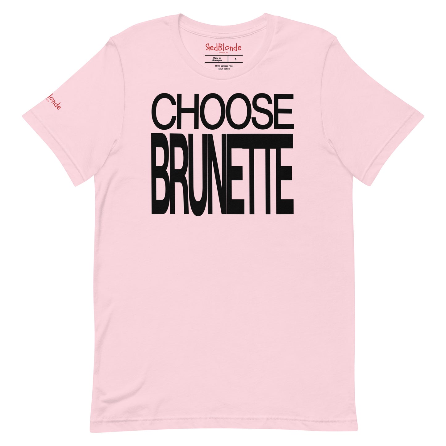 Flatlay of an 80s inspired unisex pale pink relaxed fit graphic t-shirt with “Choose Brunette” in large caps written in black. Branded RedBlonde on the inside neck and right shoulder in red