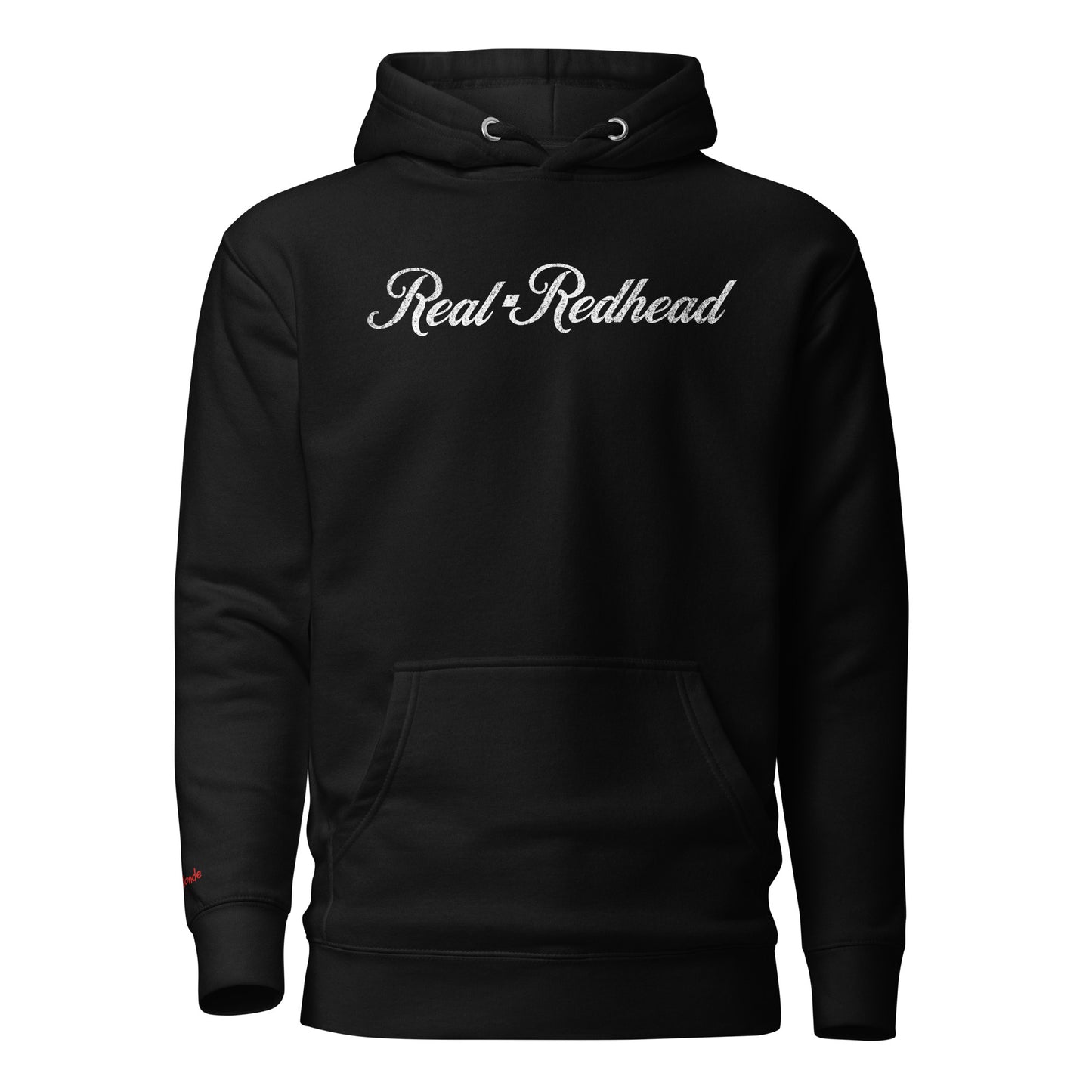 A classic black relaxed fit unisex hoodie with the words 'Real Redhead' written in white vintage milkstore font, like coco cola script. Branded RedBlonde London in red on inside neck and right sleeve