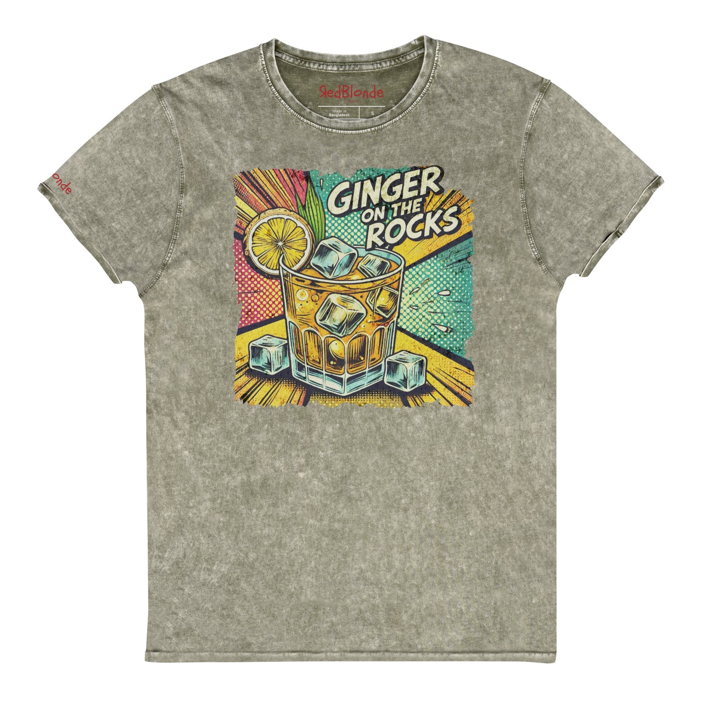 An army green acid-wash unisex denim look T-shirt featuring a vibrant, retro-style graphic of a cocktail glass filled with ice cubes, a lemon slice, and the text "GINGER ON THE ROCKS" in bold comic-style lettering. The background of the graphic includes colorful pop art elements in yellow, green, and turquoise tones. Branded RedBlonde on the inside neck and right sleeve