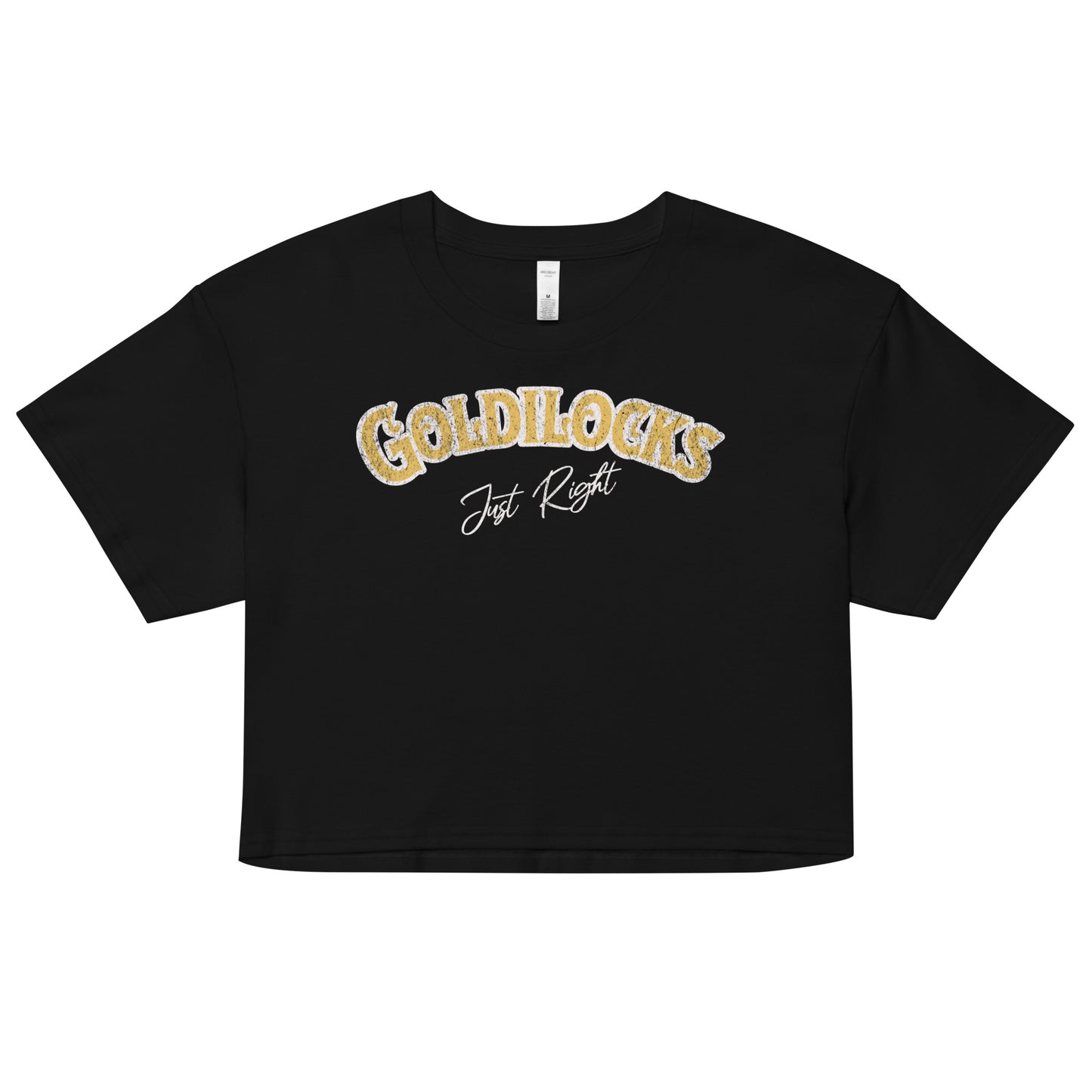 Black women’s crop top with the text “Goldilocks Just Right” in gold and white Signmaster Pro textured font, designed in a bold retro style. Branded RedBlonde on the reverse