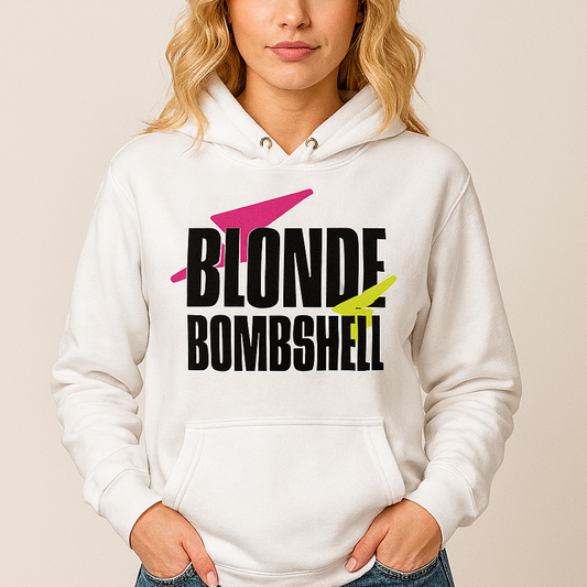 Blonde wears a Classic fit unisex white hoodie with 80s ‘Blonde Bombshell’ graphic in black with pink & yellow lightning flashes emblazoned across the chest, inspired by David Bowie. Branded RedBlonde London on inside neck and right cuff