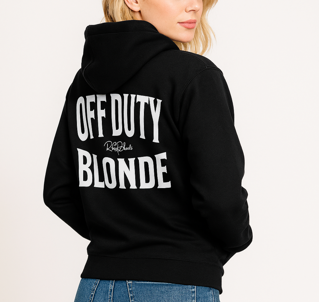 Blonde wears a classic black unisex hoodie with the words 'OFF DUTY BLONDE' written in large Brookfield white font, across the back. Branded RedBlonde London in red on inside neck and right sleeve