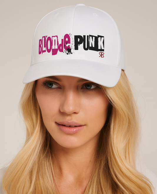 Blonde wears white trucker cap with 'Blonde Punk' in irregular printing block style caps and lowercase. Blonde is written in bright pink and Punk in black lettering. Branded RB in red