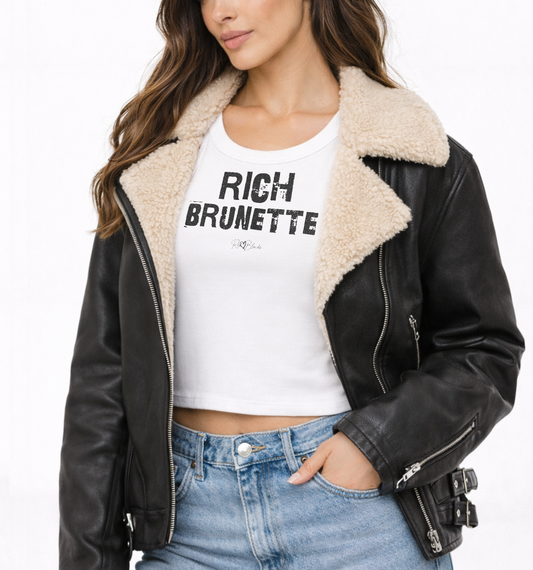 Brunette wears White acid-wash vintage tank top with bold white Ed Gein font “RICH BRUNETTE" slogan on the front and RedBlonde logo beneath.