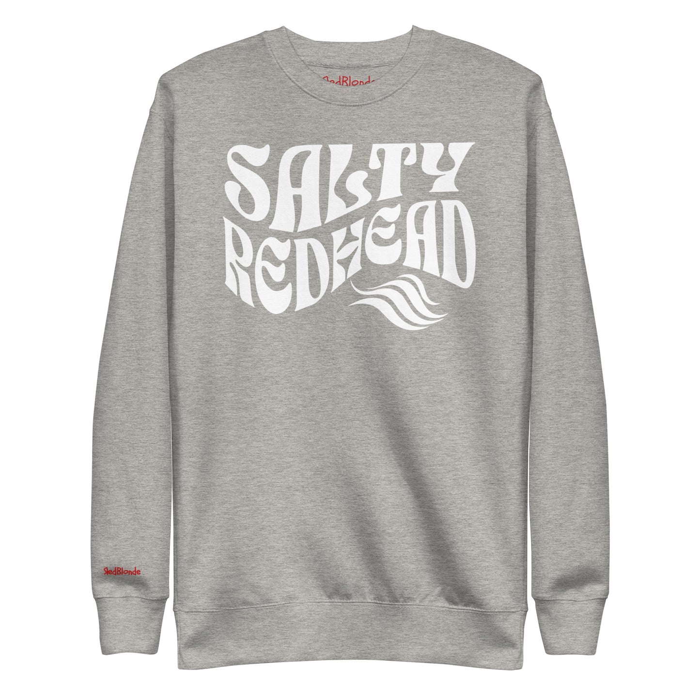 flatlay of Classic relaxed fit unisex sweatshirt in athletic light grey with 'Salty Redhead' play on words slogan in white retro wavy 70s text. Branded RedBlonde on inside neck and right cuff in red