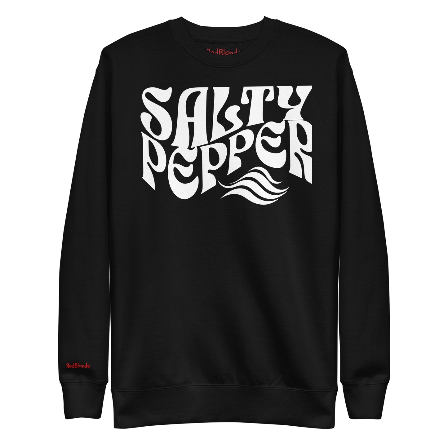 flatlay of Classic relaxed fit unisex sweatshirt in black with 'Salty Pepper' play on words slogan in white retro wavy 70s text. Branded RedBlonde on inside neck and right cuff in red