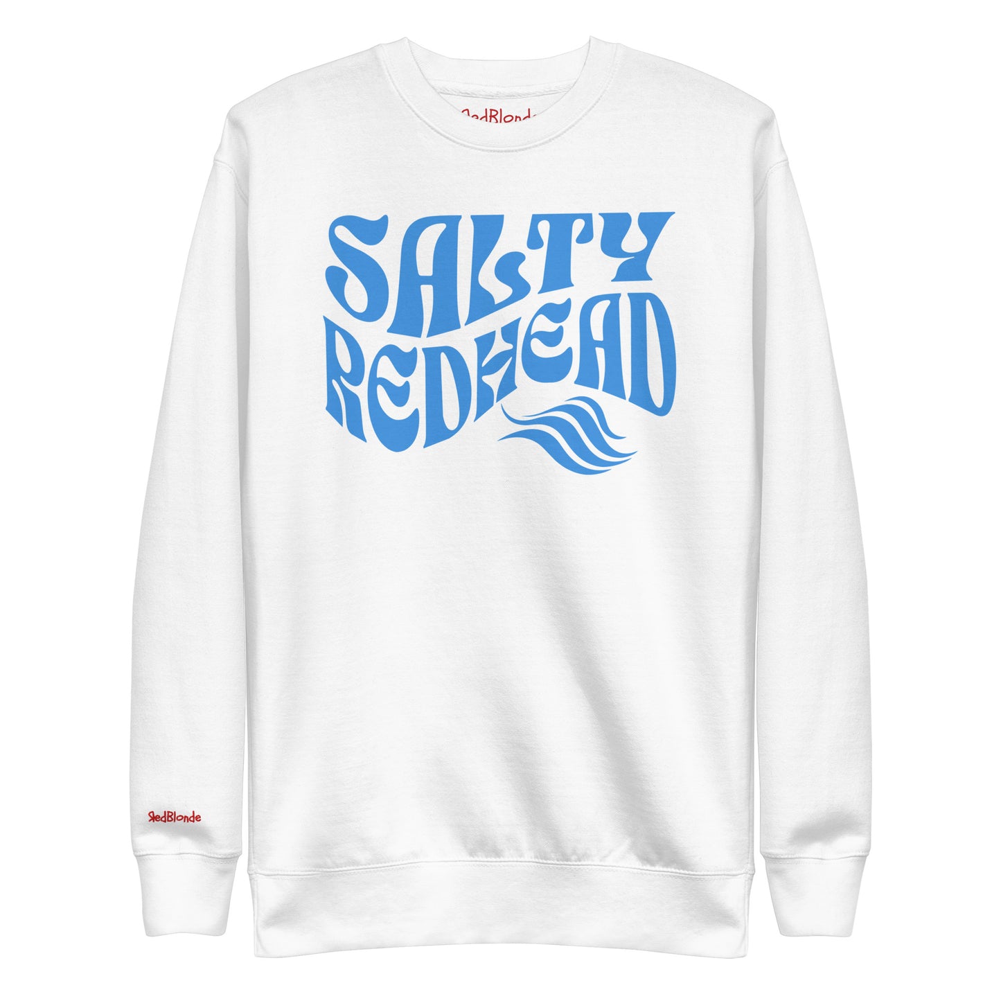 flatlay of Classic relaxed fit unisex sweatshirt in black with 'Salty Redhead' play on words slogan in blue retro wavy 70s text. Branded RedBlonde on inside neck and right cuff in red