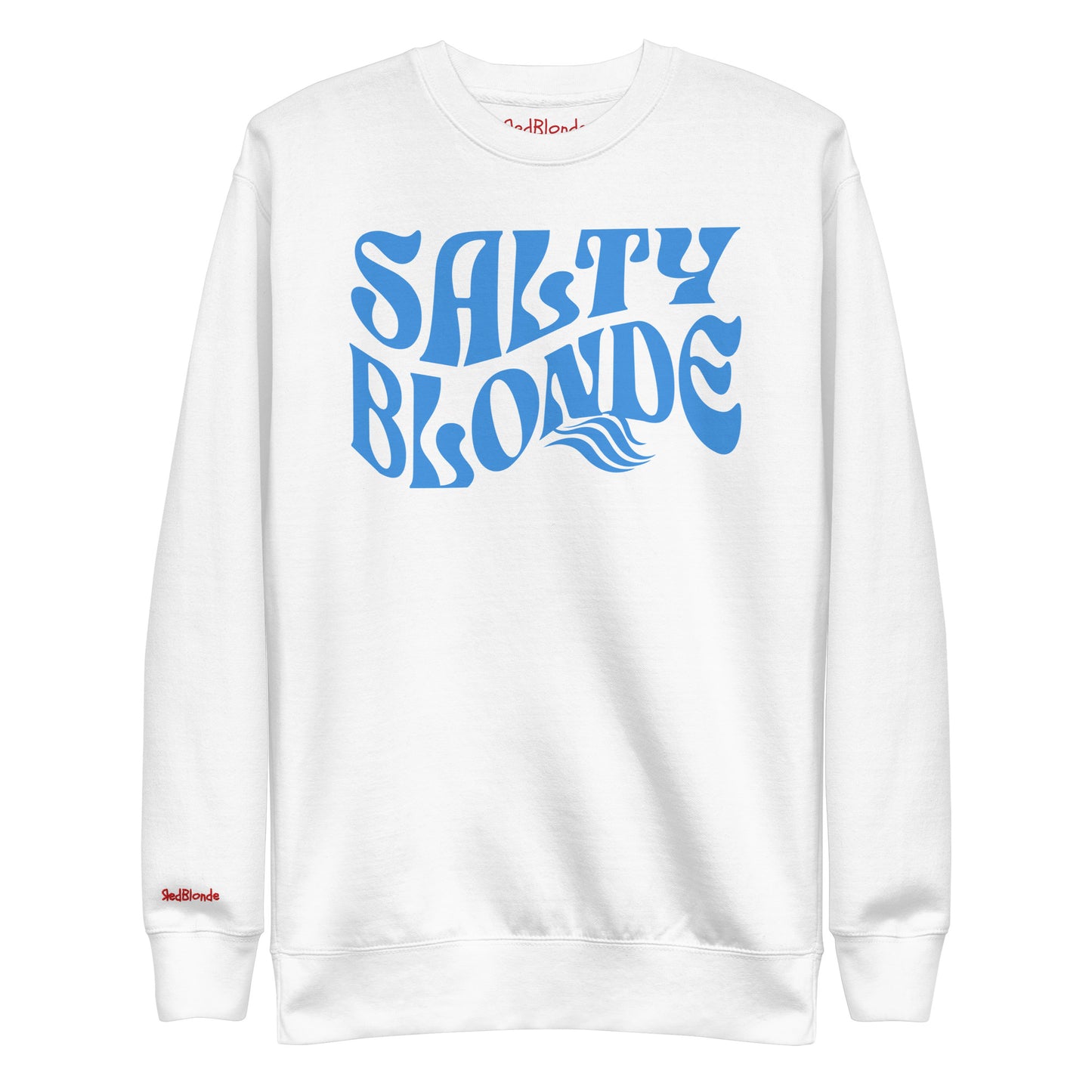 flatlay of Classic relaxed fit unisex sweatshirt in white with 'Salty Blonde' play on words slogan in blue retro 70s wavy text. Branded RedBlonde on inside neck and right cuff in red