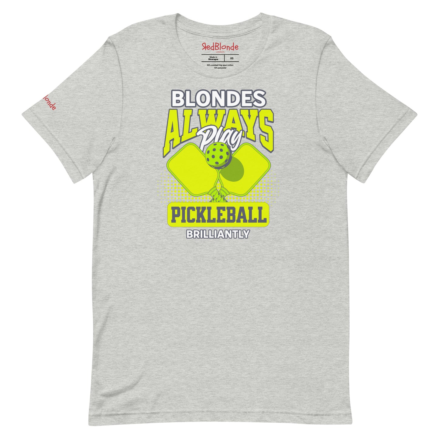 Grey unisex t-shirt featuring the phrase "Blondes Always Play Pickleball Brilliantly" in bold neon yellow and grey lettering, with two neon yellow pickleball paddles and a green pickleball in the center. Branded RedBlonde on inside the neck and on the right sleeve.