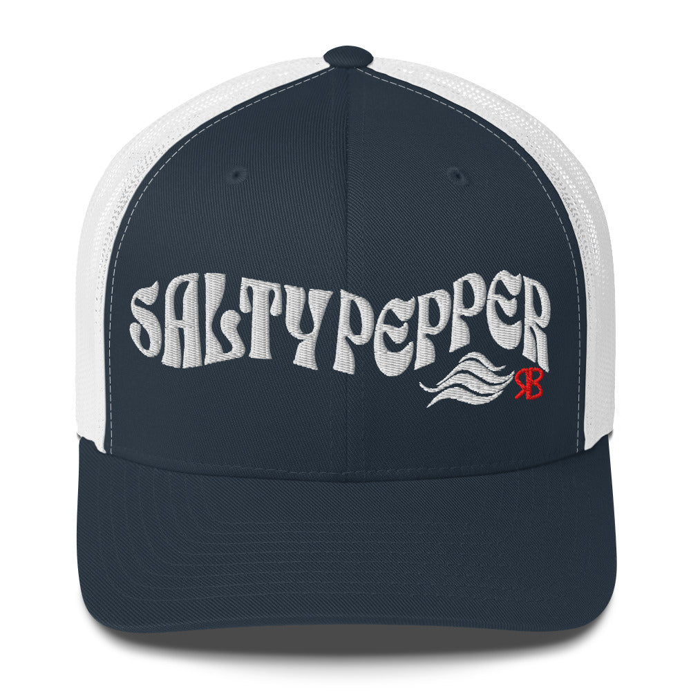 Navy/white trucker cap with 'Salty Pepper in white Solino display font. Branded RB in red