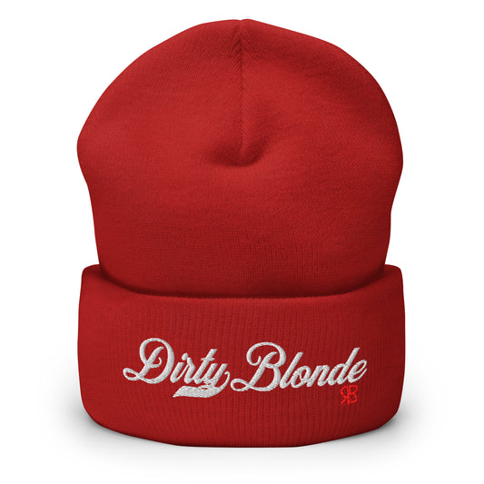 Red knitted beanie with the embroidered phrase “Dirty Blonde” in white script and a small red RB logo on the fold-over cuff, displayed against a clean white background.