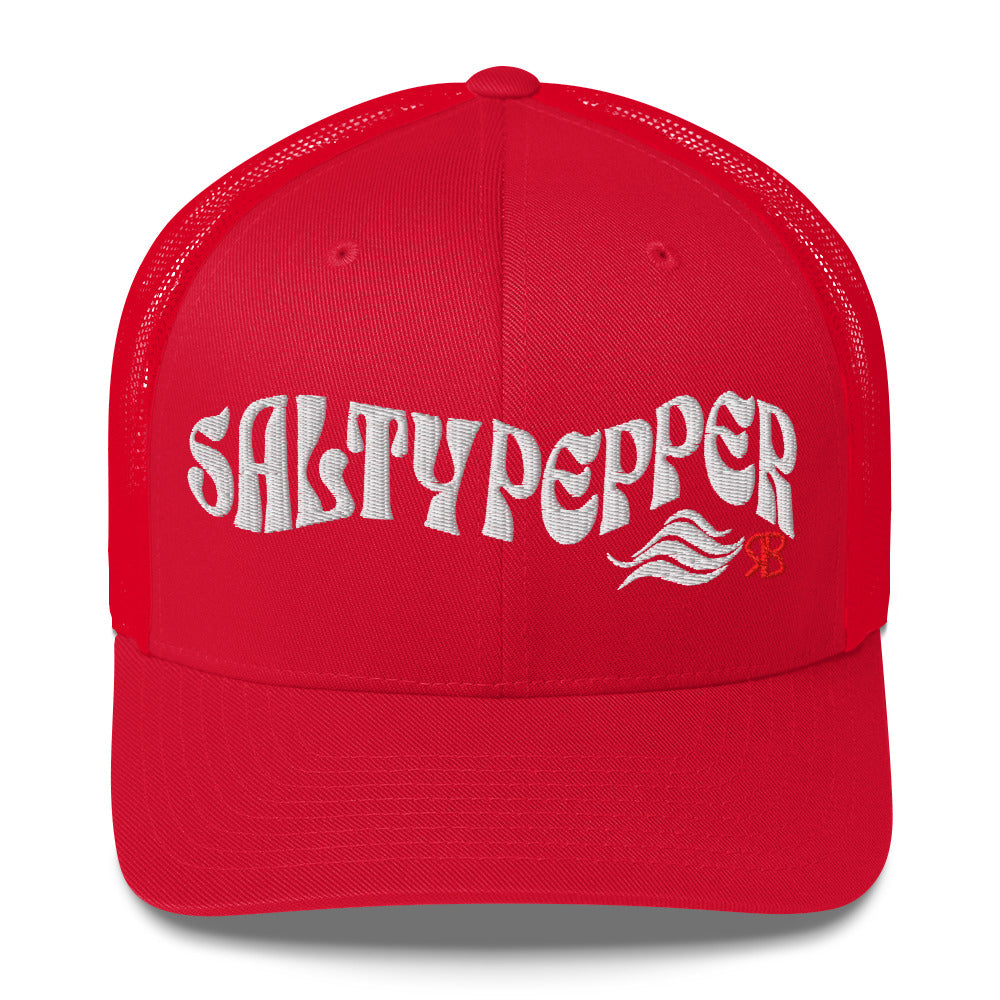 Red trucker cap with 'Salty Pepper in white Solino display font. Branded RB in red