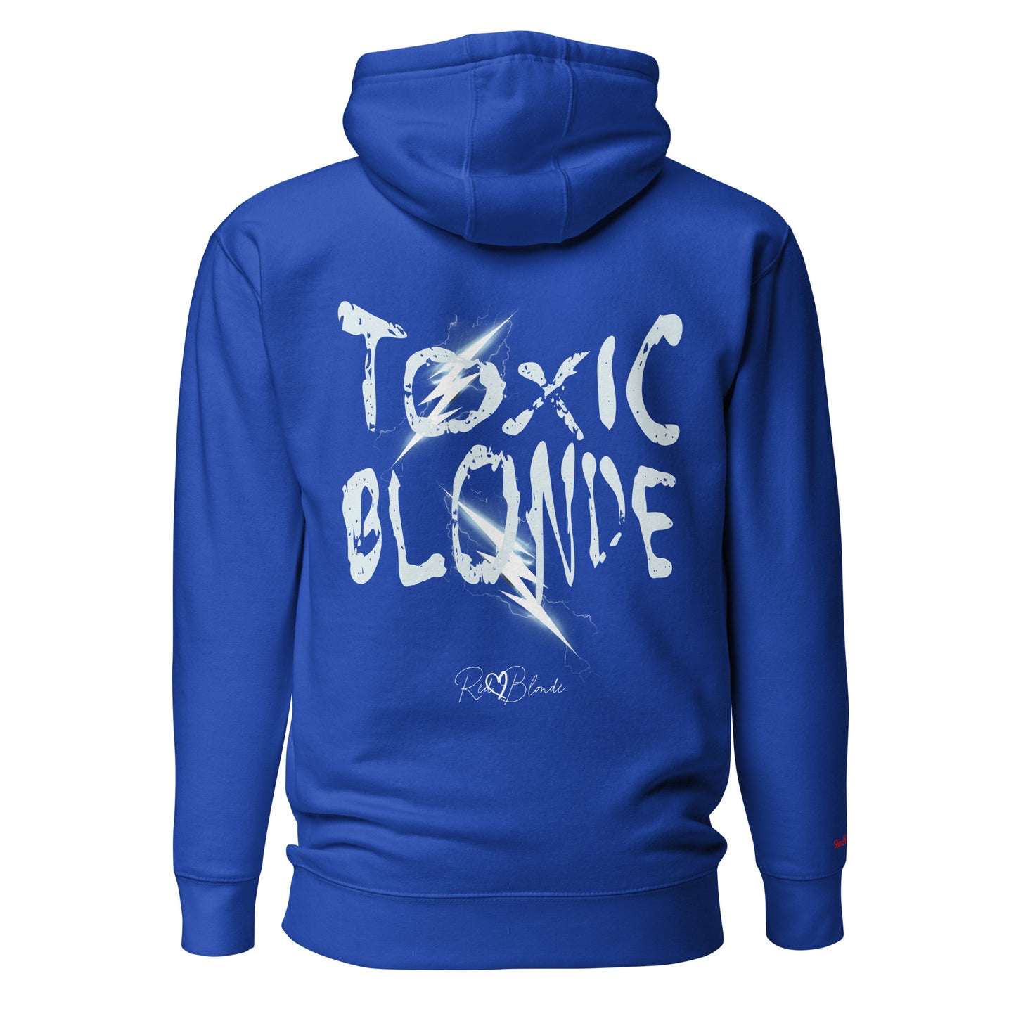 Back view of a royal blue unisex hoodie featuring bold distressed white Chainsaw Carnage text reading “Toxic Blonde” with lightning-style accents and the RedBlonde signature logo underneath. The design has an edgy, electric aesthetic.Branded RedBlonde in red on right sleeve