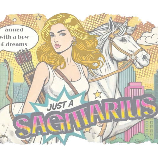 Retro pop-art Blonde Sagittarius graphic featuring a blonde woman, with bow & arrows, white stallion, and a city backdrop, captioned ‘Just a Sagittarius, armed with a bow & dreams'. Branded RedBlonde on the inside neck and right sleeve