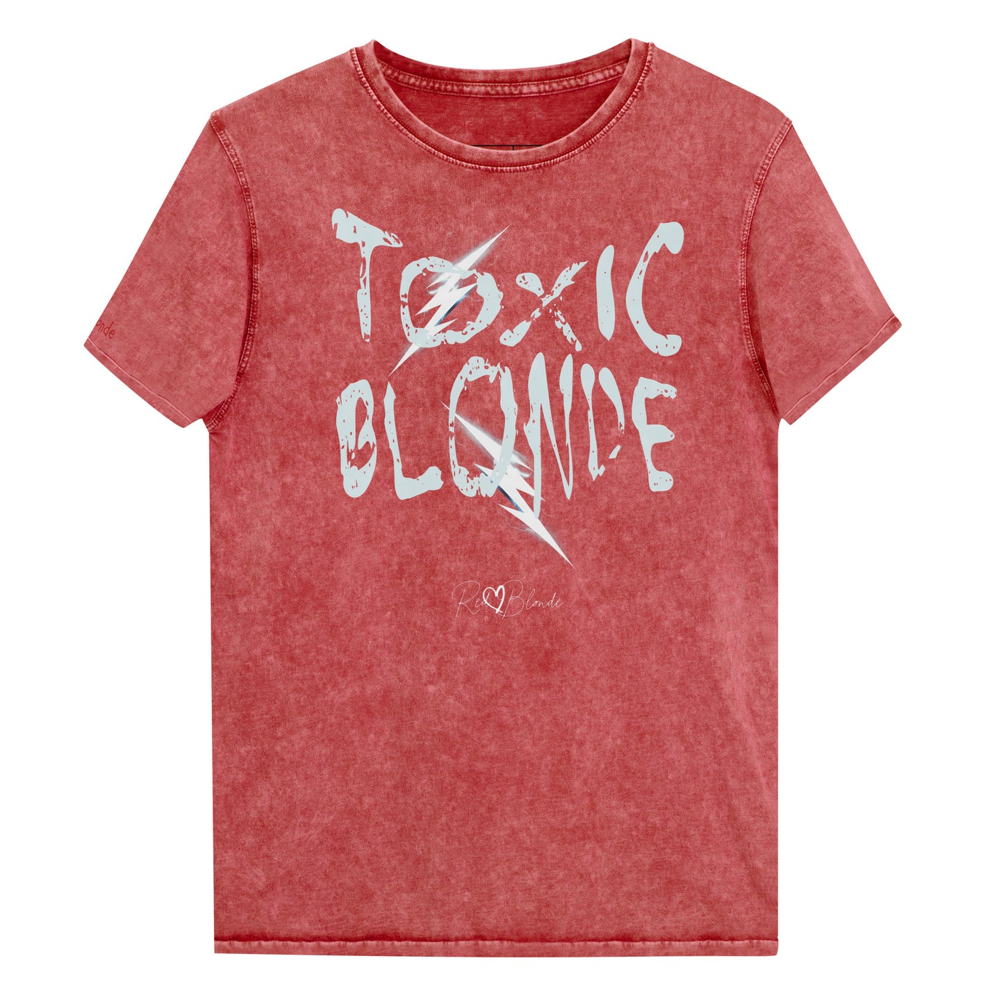 Red Garnet acid-wash denim-style unisex t-shirt with the bold graphic text “TOXIC BLONDE” in distressed light blue Chainsaw Carnage lettering across the front, featuring the RedBlonde logo subtly printed below the text. Branded RedBlonde in red in inside neck and right sleeve