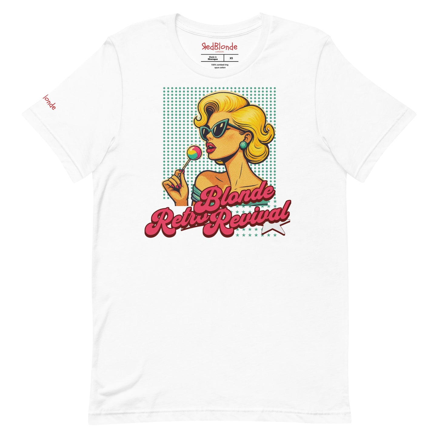 White unisex t-shirt featuring a vibrant retro pop art illustration of a glamorous blonde woman in sunglasses holding a lollipop, with bold red script text that reads "Blonde Retro Revival." Branded RedBlonde on inside neck and right sleeve