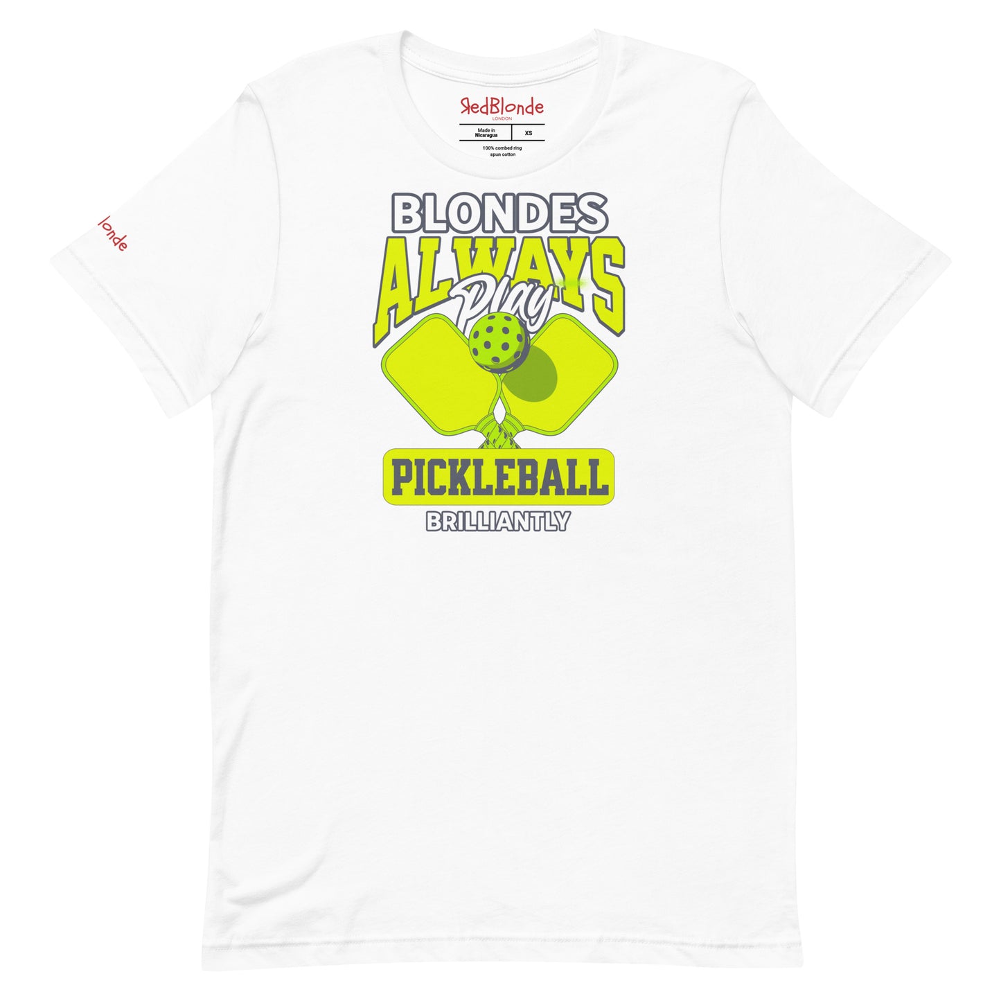 White unisex t-shirt featuring the phrase "Blondes Always Play Pickleball Brilliantly" in bold neon yellow and grey lettering, with two neon yellow pickleball paddles and a green pickleball in the center. Branded RedBlonde on inside the neck and on the right sleeve.