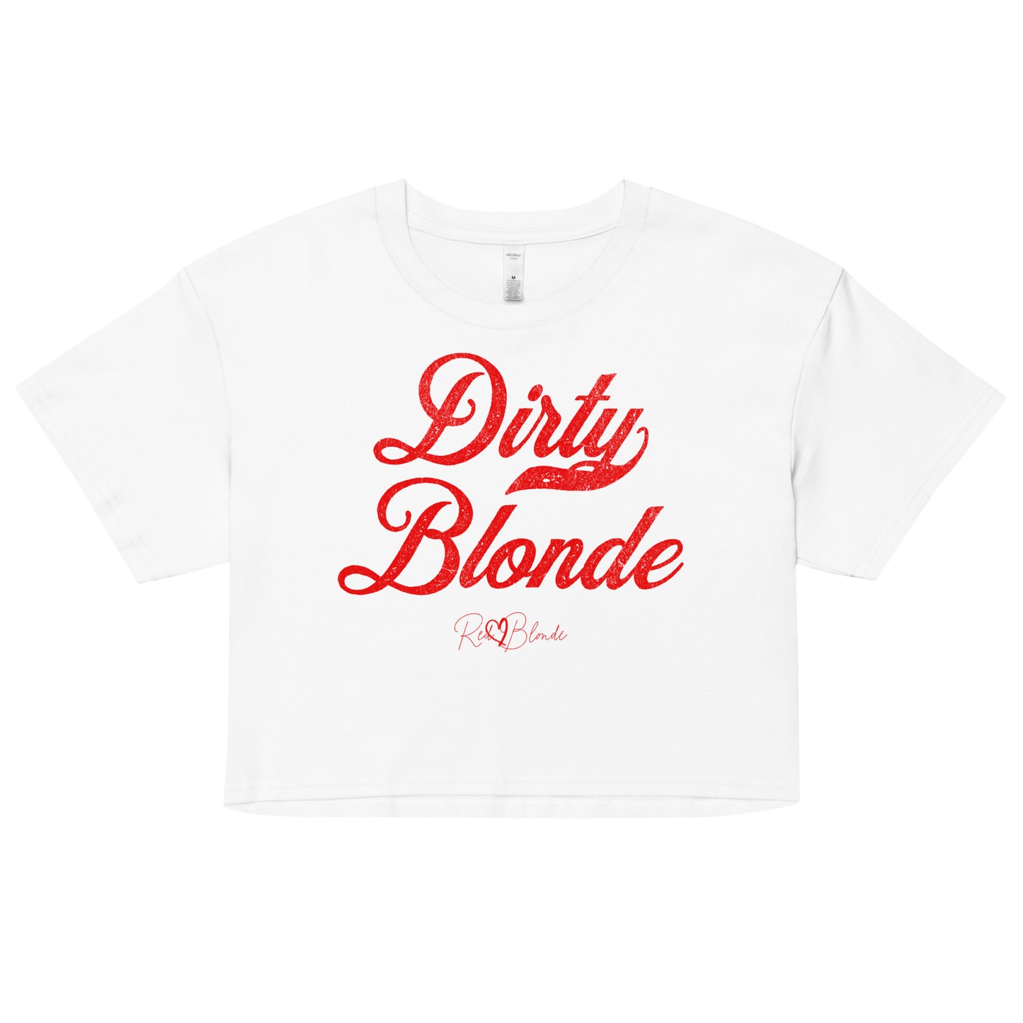 White women’s crop top featuring the phrase “Dirty Blonde” in bold, red milkstore vintage-style script across the chest. Below the phrase, the brand name “RedBlonde” is printed in a smaller, elegant handwritten font.