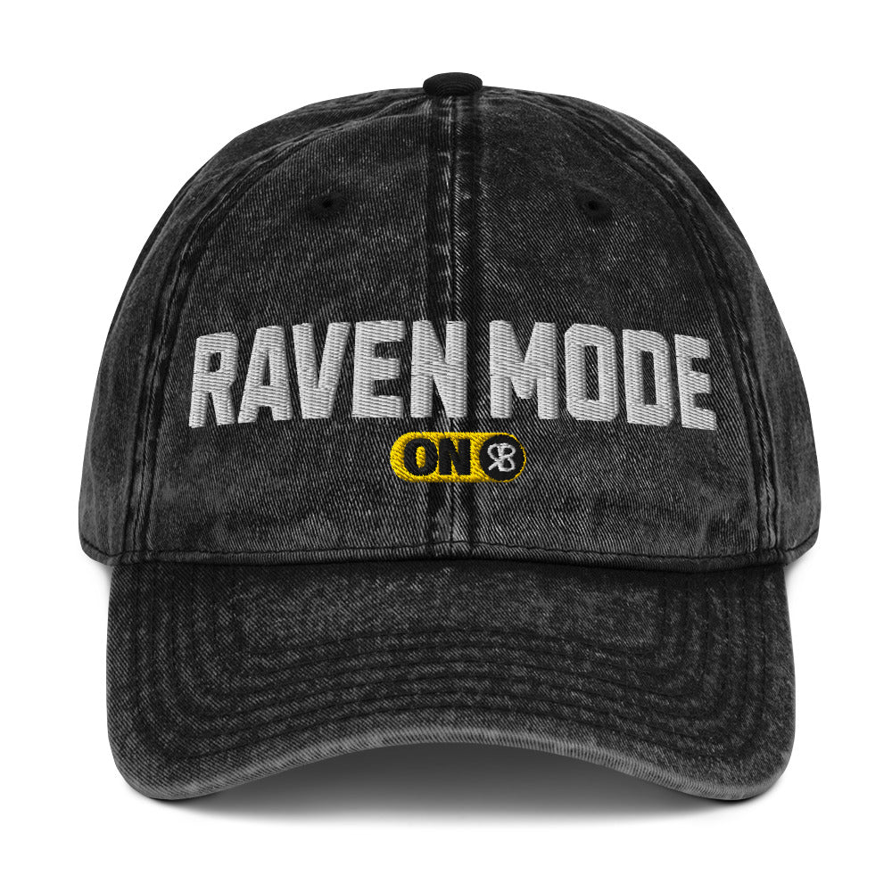 black denim cap with 'Raven Mode ON' embroidered in white Univercity font with RB logo