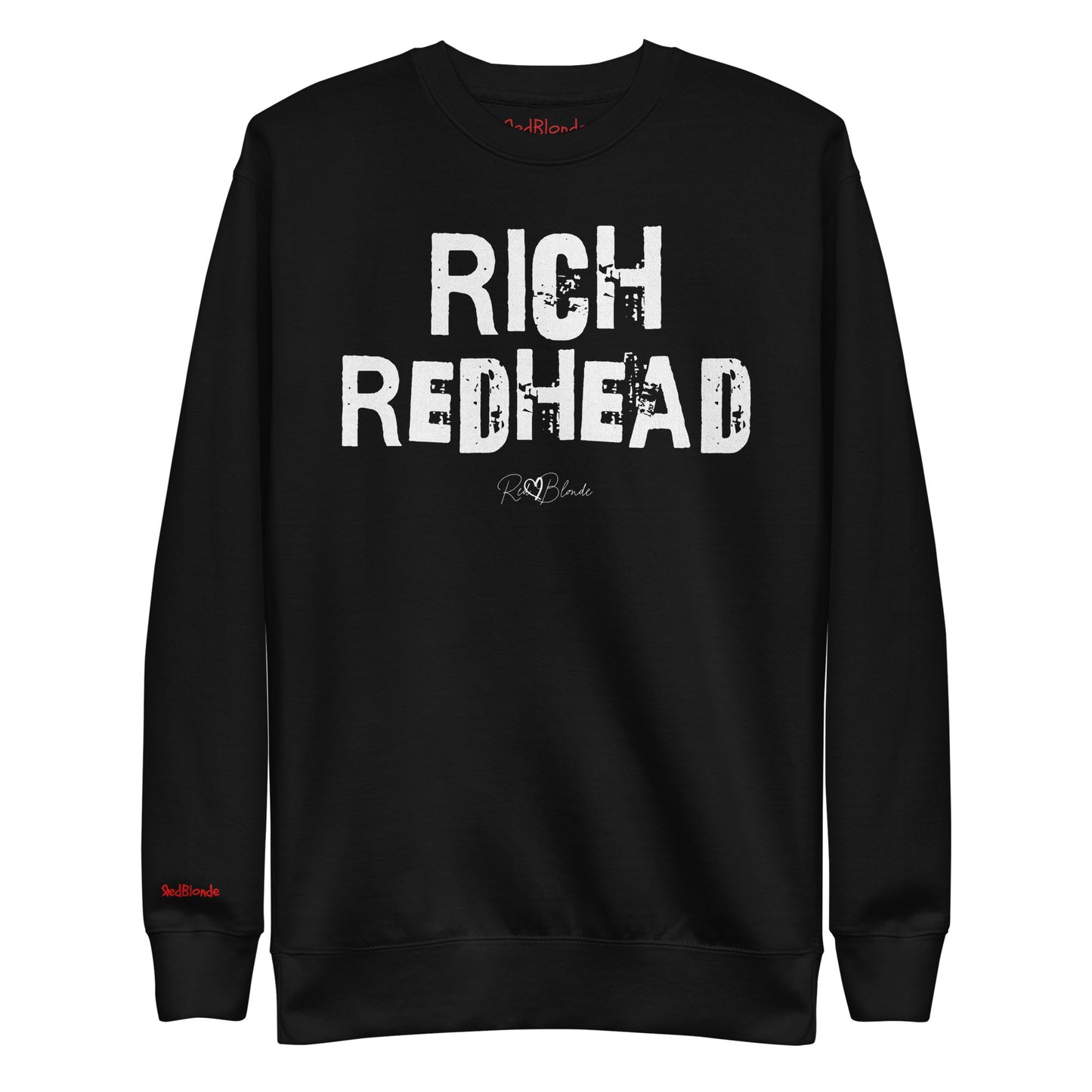 Black unisex premium sweatshirt with bold distressed white Ed Geinitext “RICH REDHEAD” on the front, featuring a subtle RedBlonde logo beneath the lettering and on the sleeve cuff and inside neck