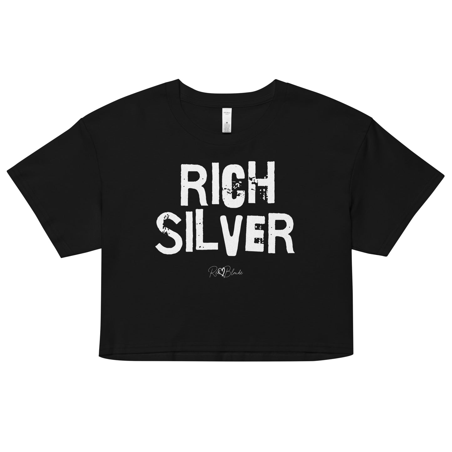 a black coloured crop top with a relaxed fit, short sleeves, and a wide crew neckline. The front features bold white distressed lettering reading “RICH SILVER” with the RedBlonde signature logo underneath in white