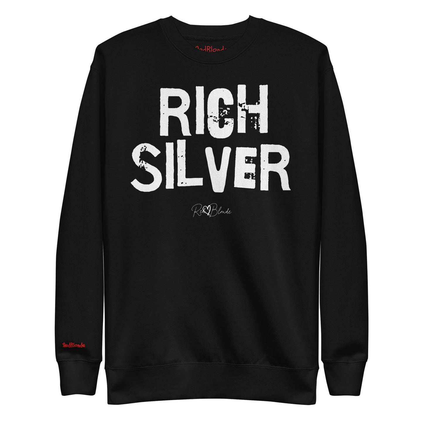Black unisex premium sweatshirt with bold distressed white Ed Geinitext “RICH SILVER” on the front, featuring a subtle RedBlonde logo beneath the lettering and on the sleeve cuff and inside neck