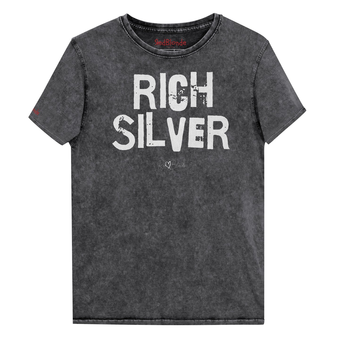 a black acid-wash unisex denim T-shirt with a distressed vintage look. The shirt features the bold white text “RICH SILVER” in a weathered Ed Gein font, and features the RedBlonde signature logo. The shirt has short sleeves, a crew neckline, and visible seam detailing for a rugged, casual style. Branded Redblonde on inside neck and right sleeve