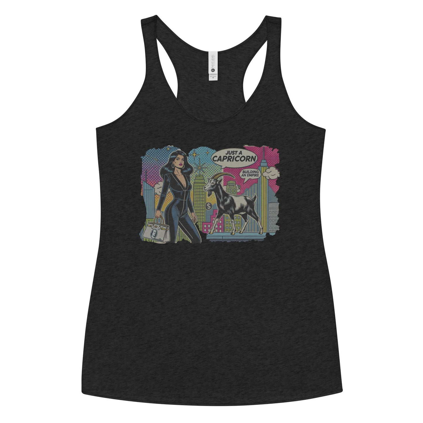 Flatlay of a black soft racerback tank t-shirt with a retro pop-art Capricorn graphic featuring a black haired woman in a black catsuit, carrying a bag, with a goat and a city skyscraper backdrop, captioned ‘Just a Capricorn, Building an empire'