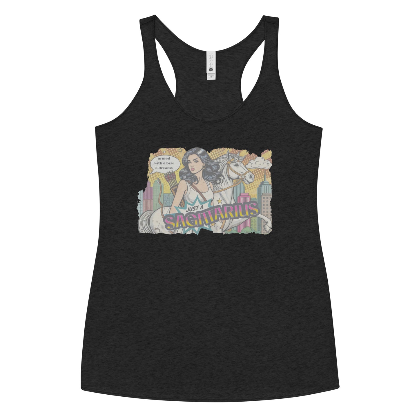 Flatlay of a black soft racerback tank t-shirt with a retro pop-art Sagittarius graphic featuring a black haired woman, with bow & arrows, white stallion, and a city backdrop, captioned ‘Just a Sagittarius, armed with a bow & dreams'