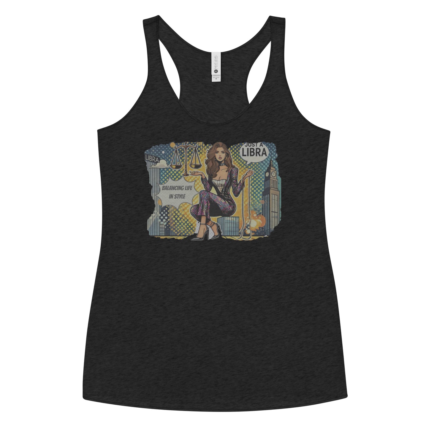 Flatlay of a heather black soft racerback tank t-shirt with a retro pop-art brunette Libra graphic featuring a brunette woman, scales, and a city backdrop, captioned ‘Just a Libra, Balancing Life in Style’.