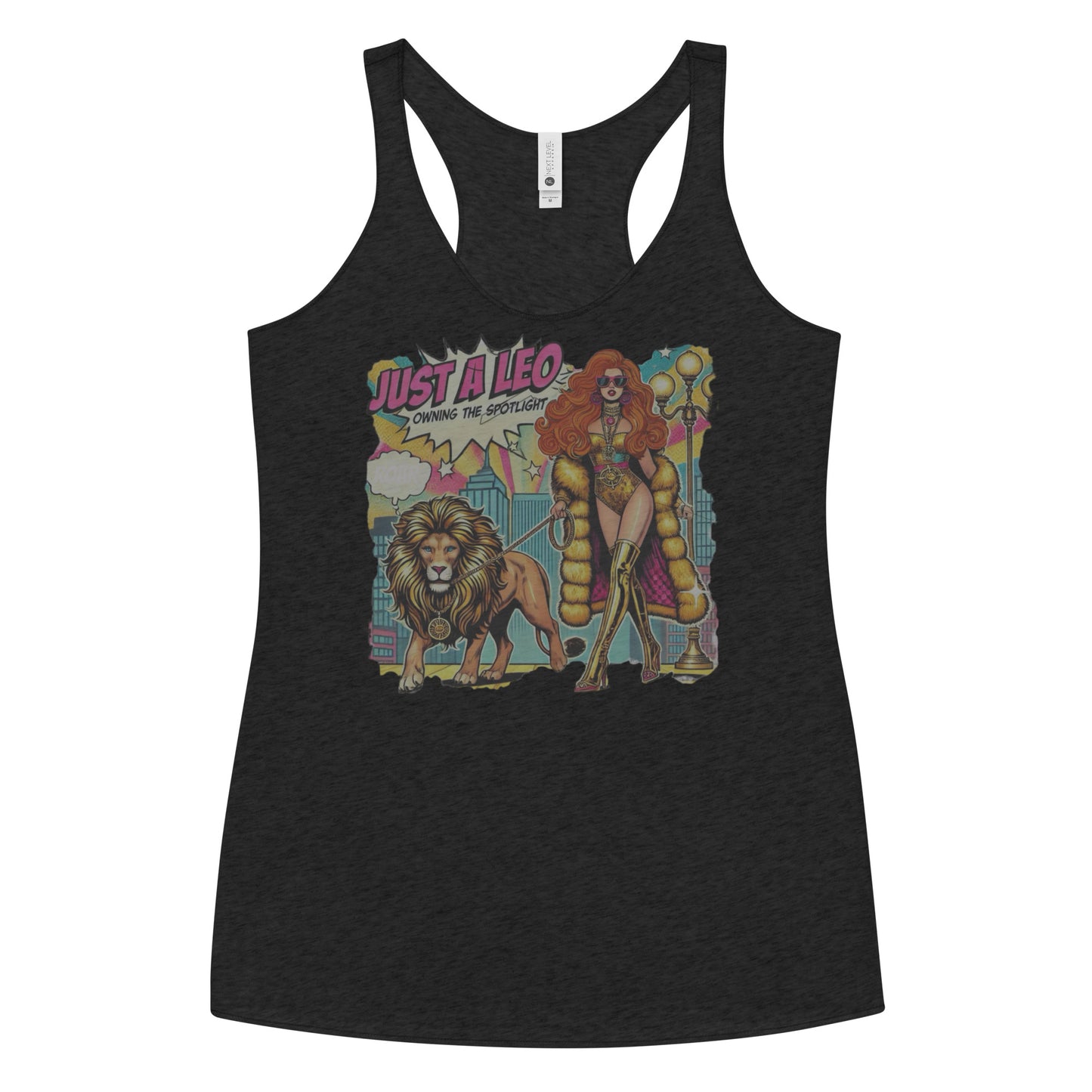 Flatlay of a heather black soft racerback tank t-shirt with a retro pop-art redhead Leo graphic featuring a redhead woman in a gold swimsuit, gold over the knee boots, gold medallion and long fur coat, walking a lion on a leash wearing a gold medallion, with a caption bubble 'Roar', with a city and round bulb street lights in the background captioned ‘Just a Leo, Owning the Spotlight'