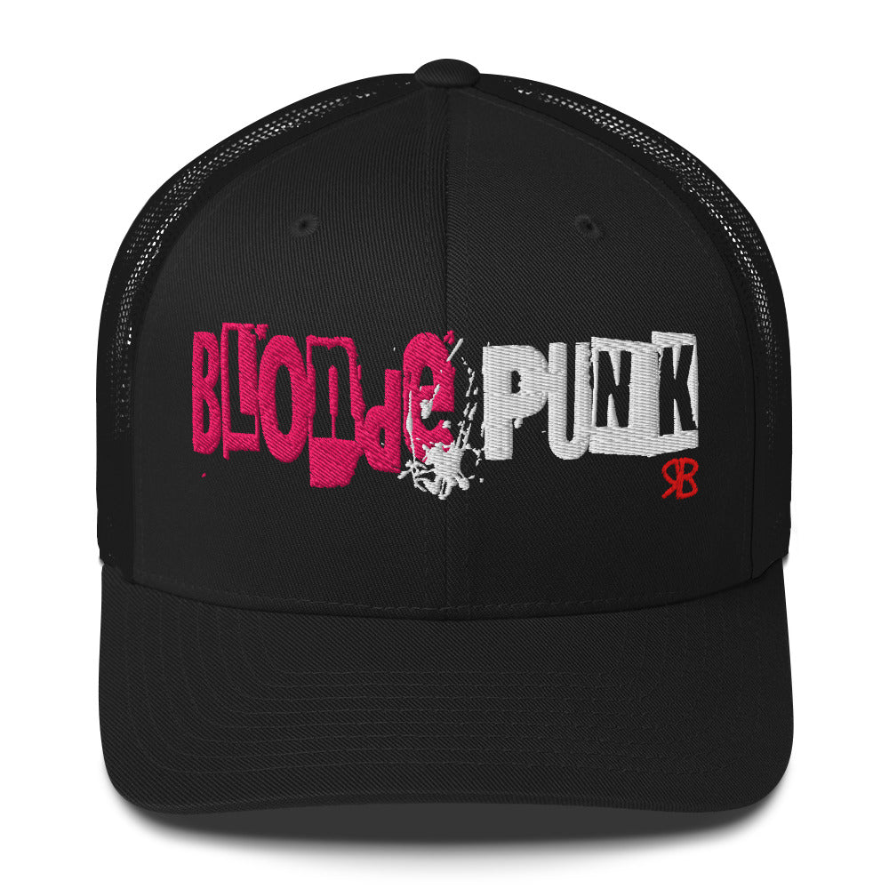black trucker cap with 'Blonde Punk' in irregular printing block style caps and lowercase. Blonde is written in bright pink and Punk in black lettering. Branded RB in red