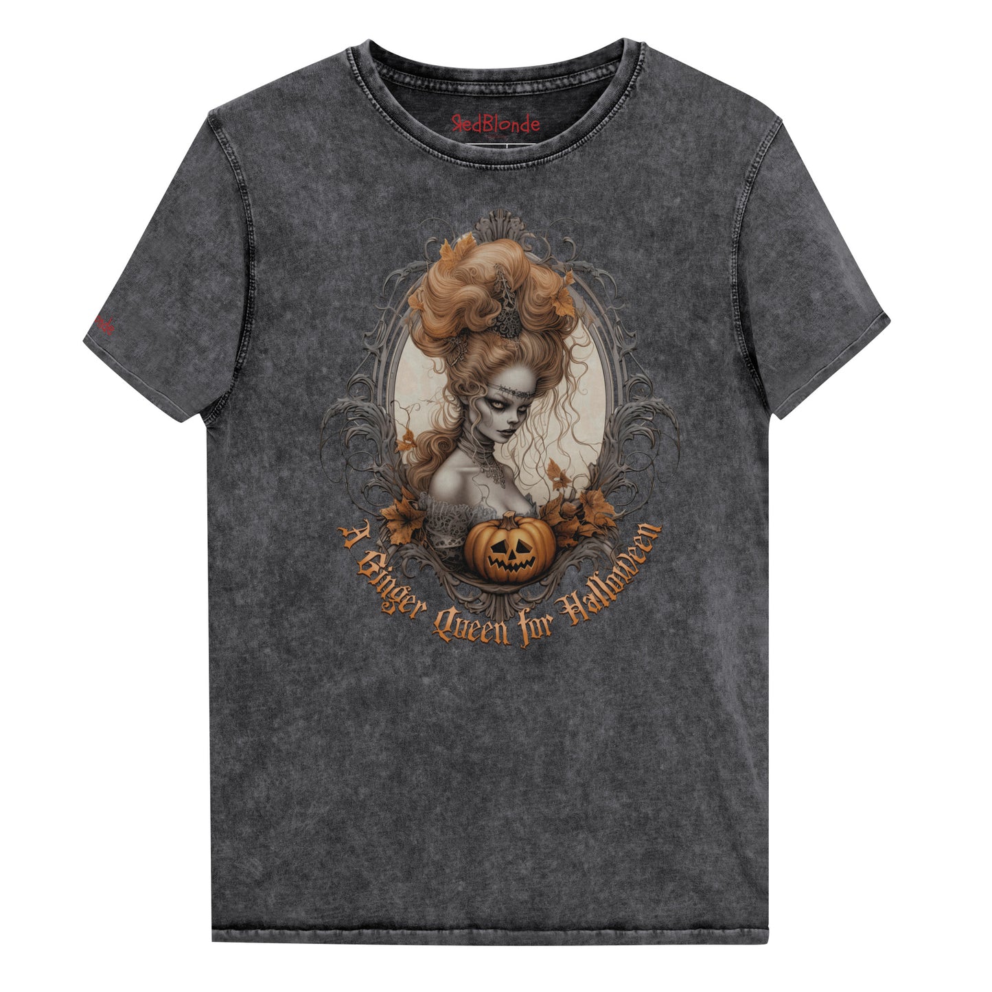 Black acid-wash unisex T-shirt featuring a gothic-style illustration of ginger-haired woman with an elaborate beehive hairstyle, framed by ornate scrollwork, autumn leaves, and a carved pumpkin. The design is captioned with the text ‘A Blonde Queen for Halloween’ in vintage Dark Angle lettering. Branded RedBlonde in red on inside neck and right sleeve