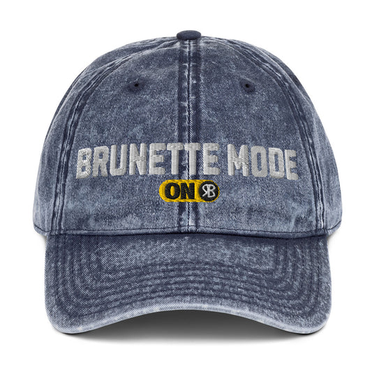 blue denim cap with 'Brunette Mode ON' embroidered in white Univercity font with RB logo