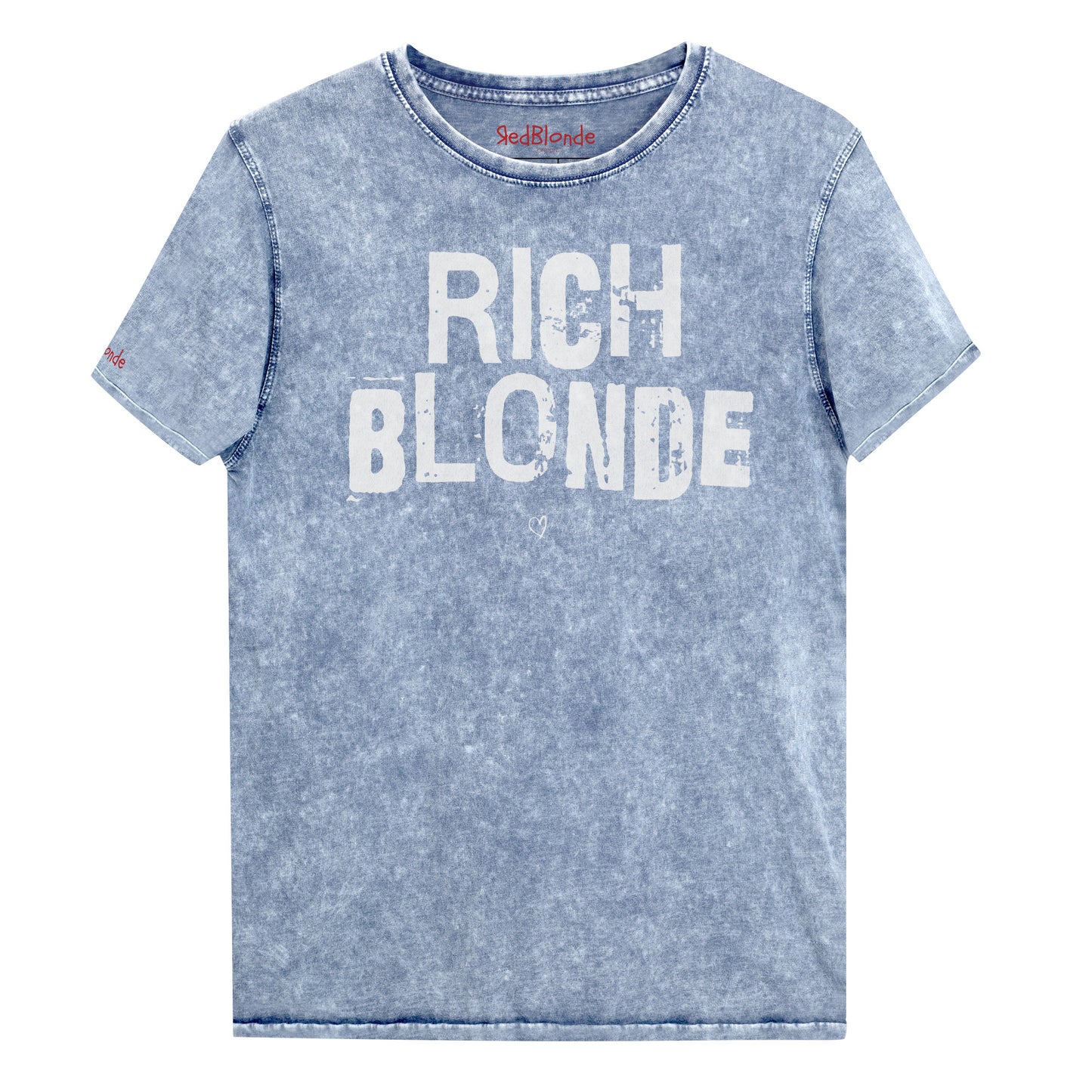 denim blue acid-wash unisex denim T-shirt with a distressed vintage look. The shirt features "RICH BLONDE" in bold white Ed Gein font with the RedBlonde signature logo underneath. The shirt has short sleeves, a crew neckline, and visible seam detailing for a rugged, casual style. Branded Redblonde on inside neck and right sleeve
