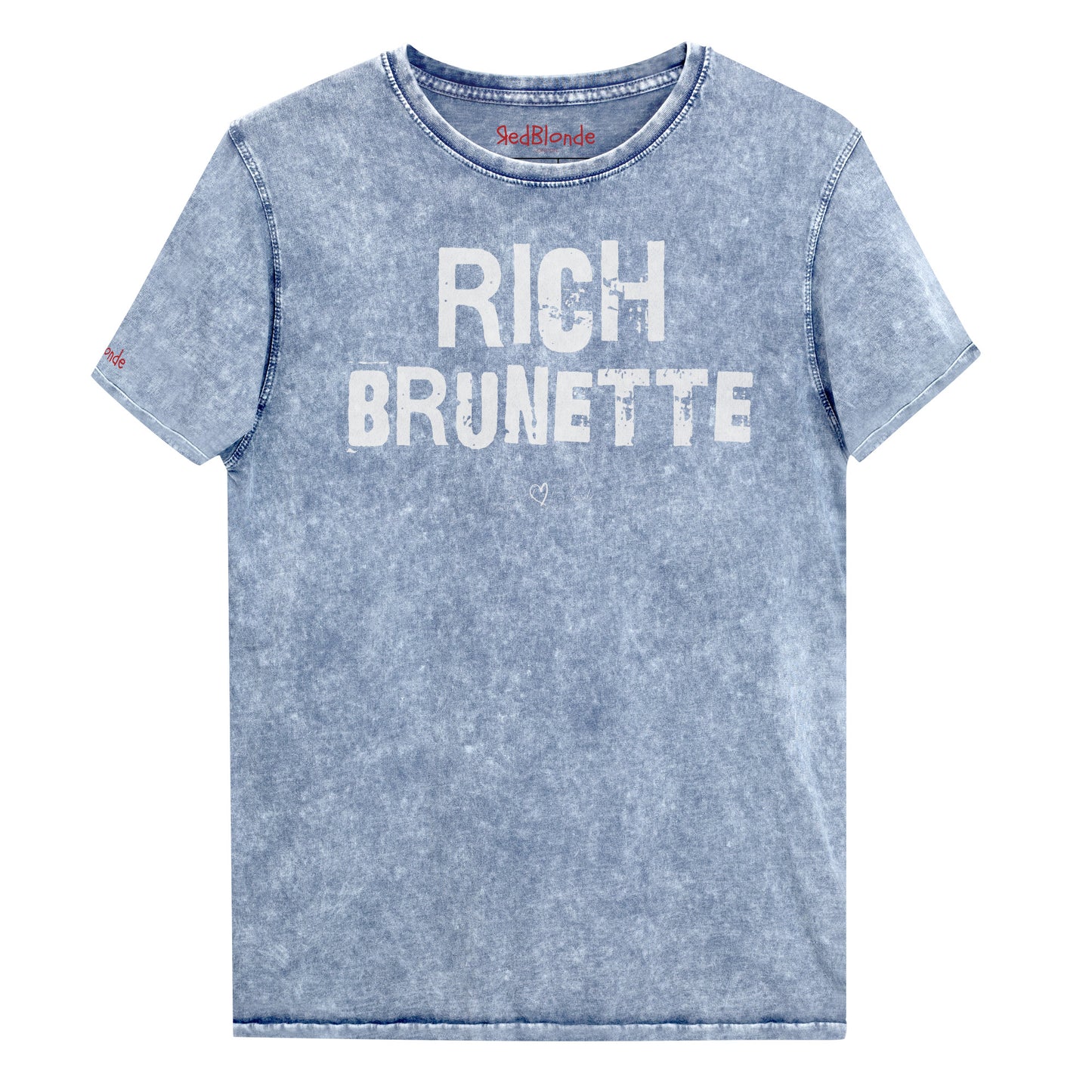 blue acid-wash unisex denim T-shirt with a distressed vintage look. The shirt features the bold white text “RICH BRUNETTE” in a weathered Ed Gein font, and features the RedBlonde signature logo. The shirt has short sleeves, a crew neckline, and visible seam detailing for a rugged, casual style. Branded Redblonde on inside neck and right sleeve