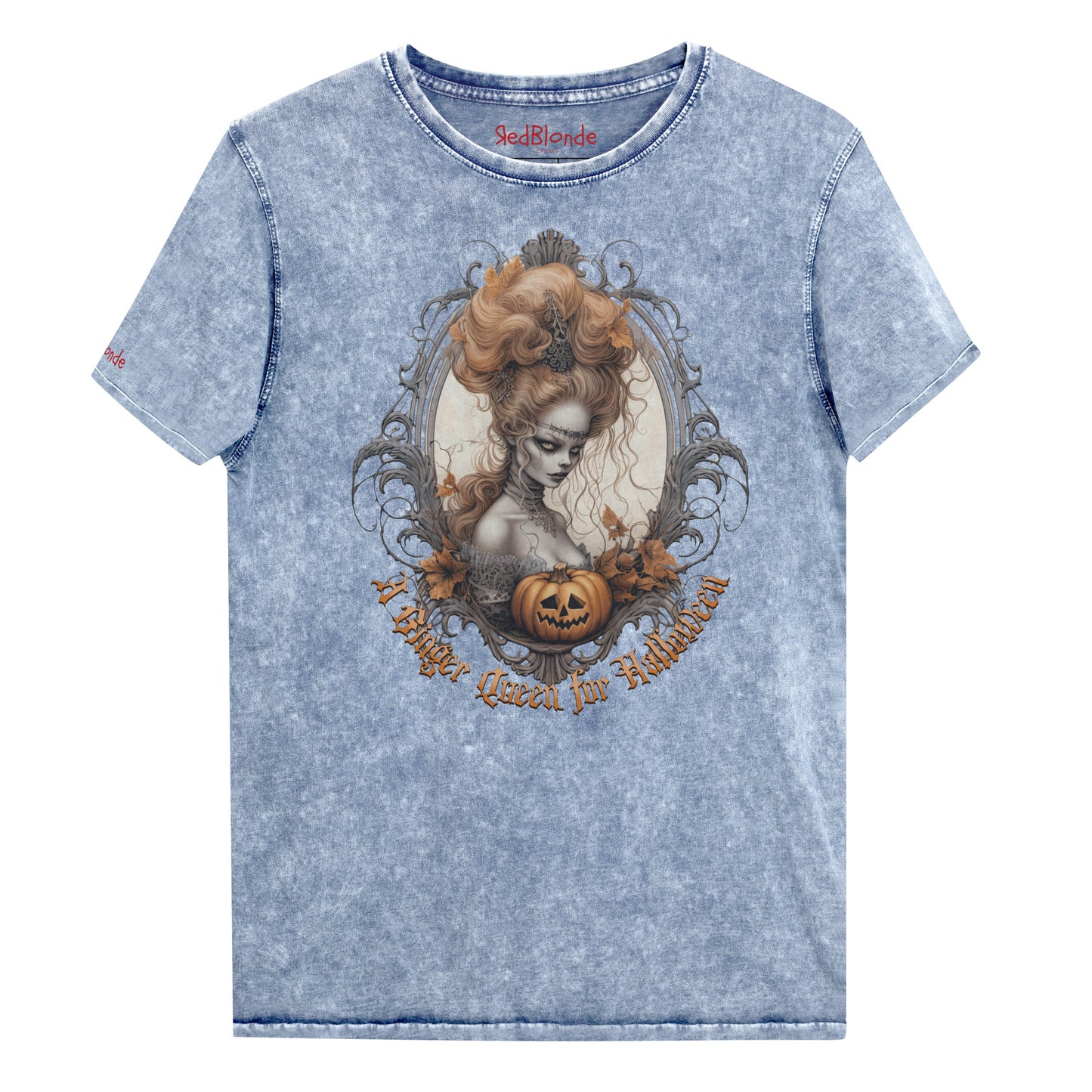 Blue acid-wash unisex T-shirt featuring a gothic-style illustration of ginger-haired woman with an elaborate beehive hairstyle, framed by ornate scrollwork, autumn leaves, and a carved pumpkin. The design is captioned with the text ‘A Blonde Queen for Halloween’ in vintage Dark Angle lettering. Branded RedBlonde in red on inside neck and right sleeve
