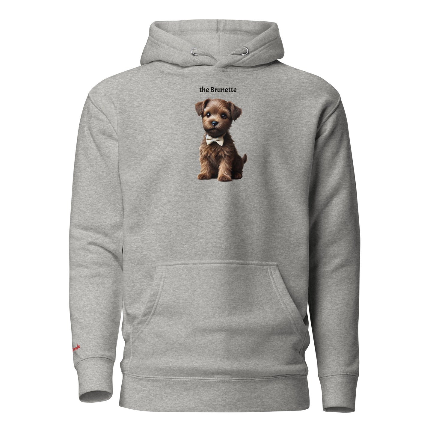Flatlay of carbon grey relaxed fit unisex hoodie with a cute graphic of a Brunette puppy wearing a bow-tie and the words 'the Brunette' linking to Brunette hair. Branded RedBlonde in red on inside neck and right cuff