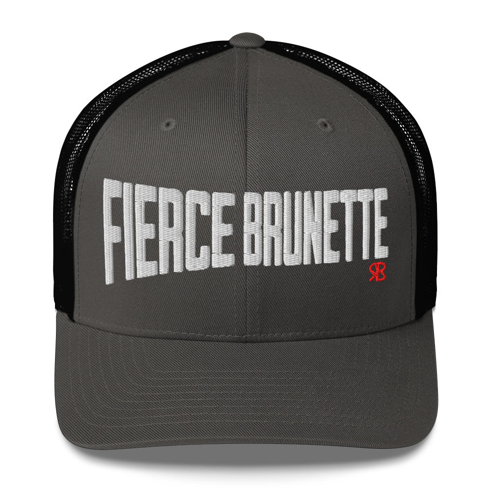 charcoal/black retro trucker cap with bold white embroidered text “Fierce Brunette” across the front, featuring a small red RB logo on the side.