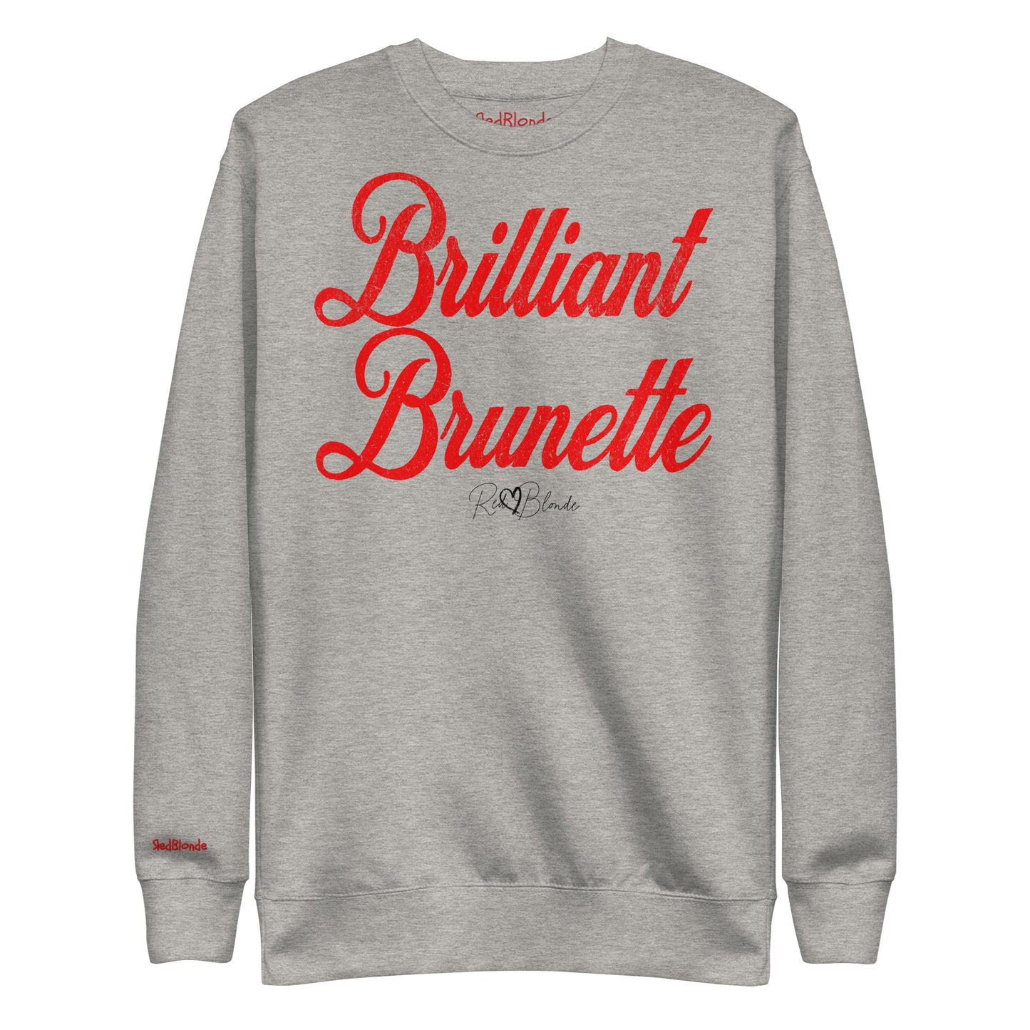 A classic grey relaxed fit unisex sweatshirt with the words 'Brilliant Brunette' written in large red vintage milkstore font, like coco cola script. Branded RedBlonde London in red on inside neck and right sleeve