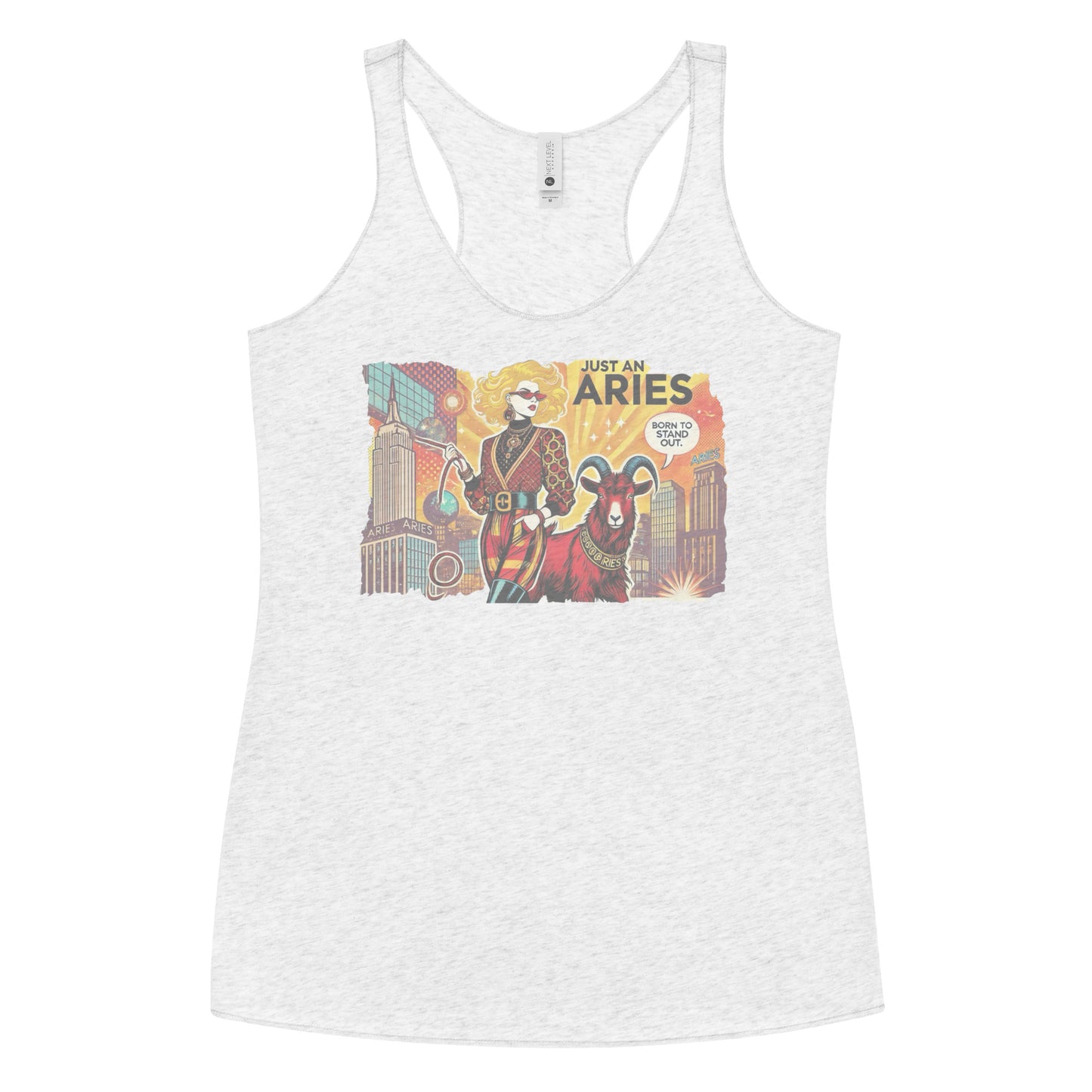 Flatlay of a heather white soft racerback tank t-shirt with a retro pop-art Blonde Aries graphic featuring a Blonde woman, wearing a belted catsuit and high boots with one hand in her pocket, with a ram by her side and a city backdrop, captioned ‘Just an Aries, born to stand out'