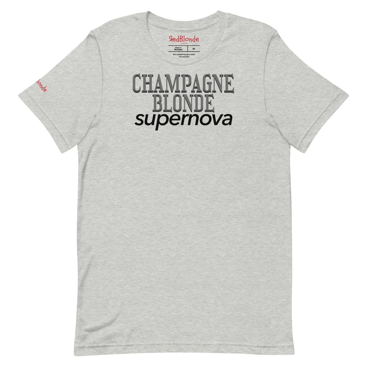 flatlay of grey unisex t-shirt with the words 'CHAMPAGNE BLONDE' in grey Girasoll font with 'supernova' underneath in black. Branded RedBlonde in Red on inside neck and right sleeve