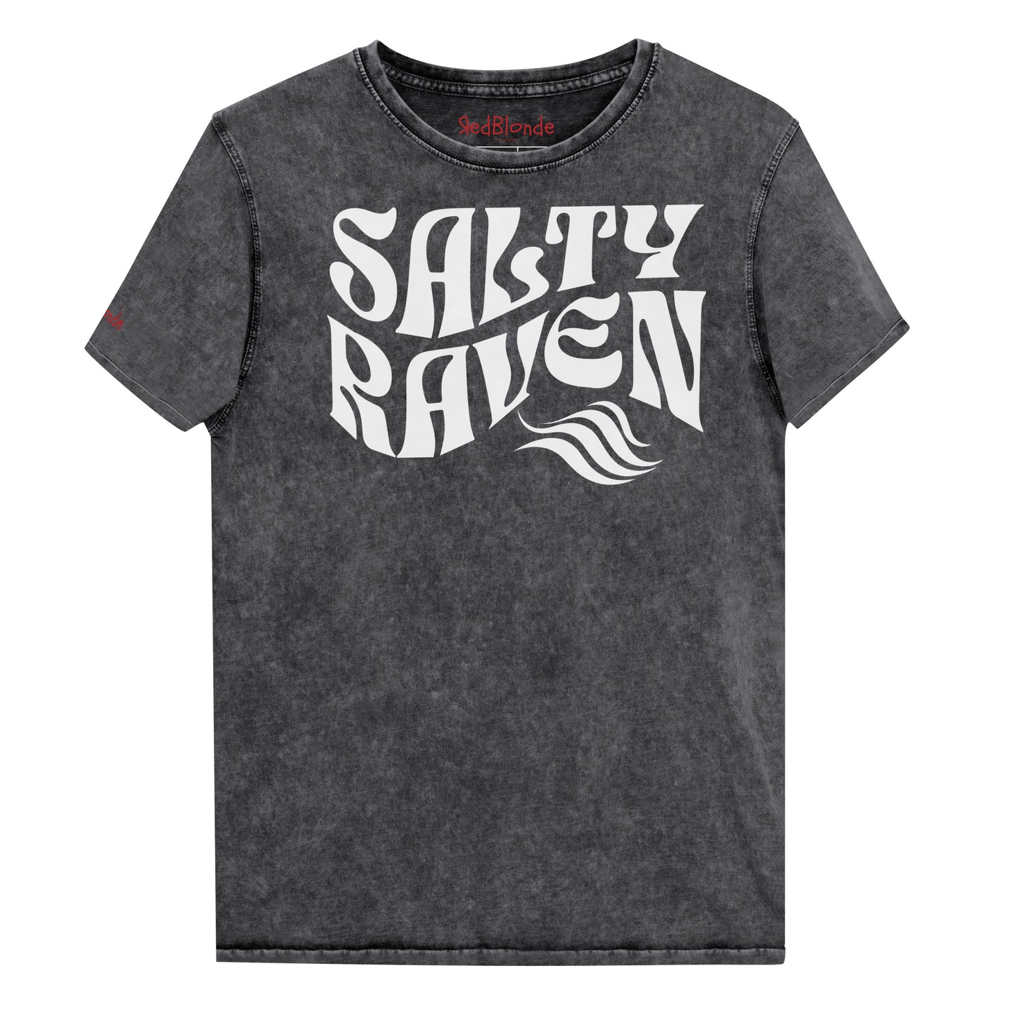 flatlay of unisex relaxed fit soft vintage black denim wash vintage graphic t-shirt with the slogan 'Salty Raven' in white retro 70s wavy font. Branded RedBlonde in red on inside neck and right sleeve