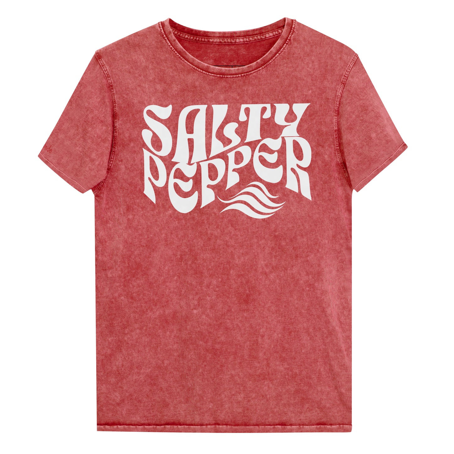 flatlay of unisex relaxed fit soft garnet red denim wash vintage graphic t-shirt with the slogan 'Salty Pepper' in white retro 70s wavy font. Branded RedBlonde in red on inside neck and right sleeve