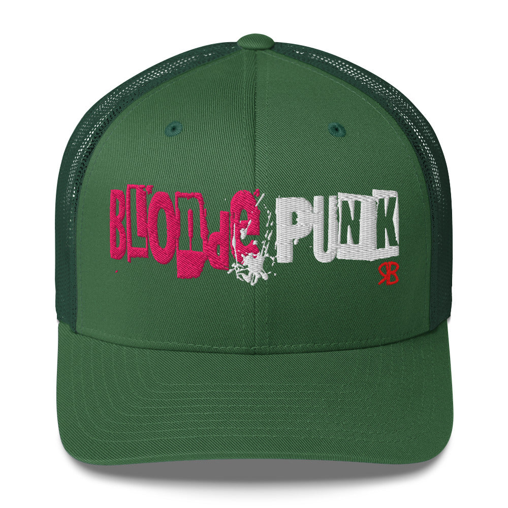 green trucker cap with 'Blonde Punk' in irregular printing block style caps and lowercase. Blonde is written in bright pink and Punk in black lettering. Branded RB in red