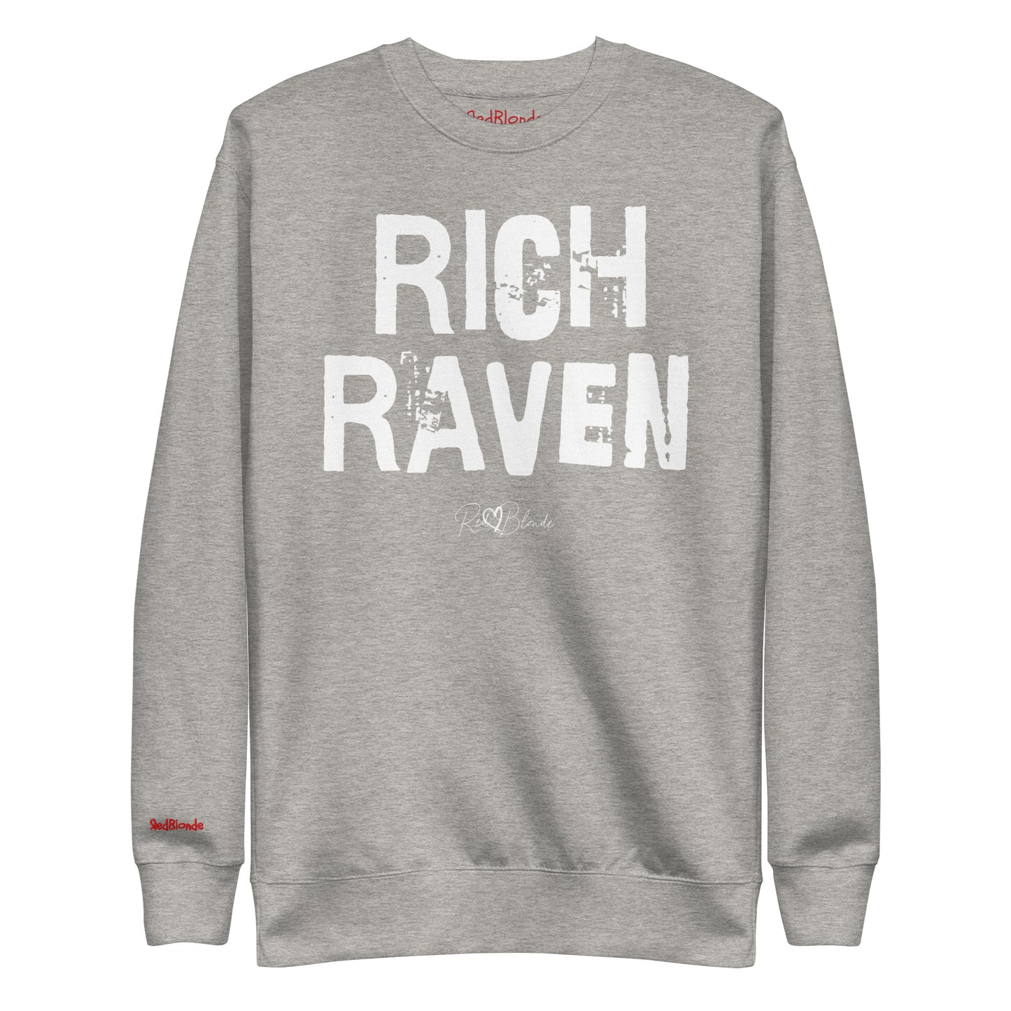 grey unisex premium sweatshirt with bold distressed white Ed Geinitext “RICH RAVEN” on the front, featuring a subtle RedBlonde logo beneath the lettering and on the sleeve cuff and inside neck