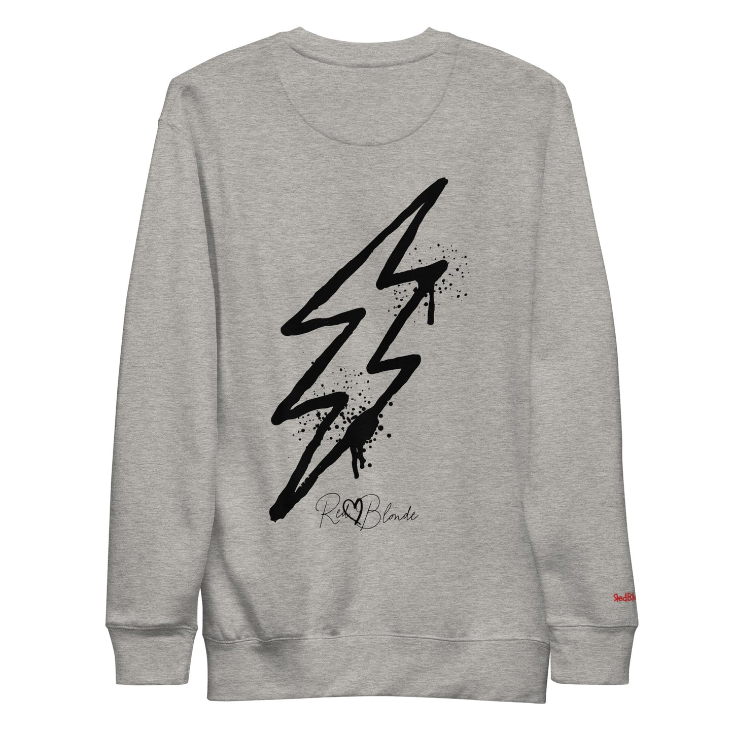 Back view of a grey unisex sweatshirt featuring a bold black lightning bolt graphic with paint-splatter detail and the RedBlonde logo printed below. The design has an edgy, electric streetwear vibe. Branded RedBlonde in red on right sleeve