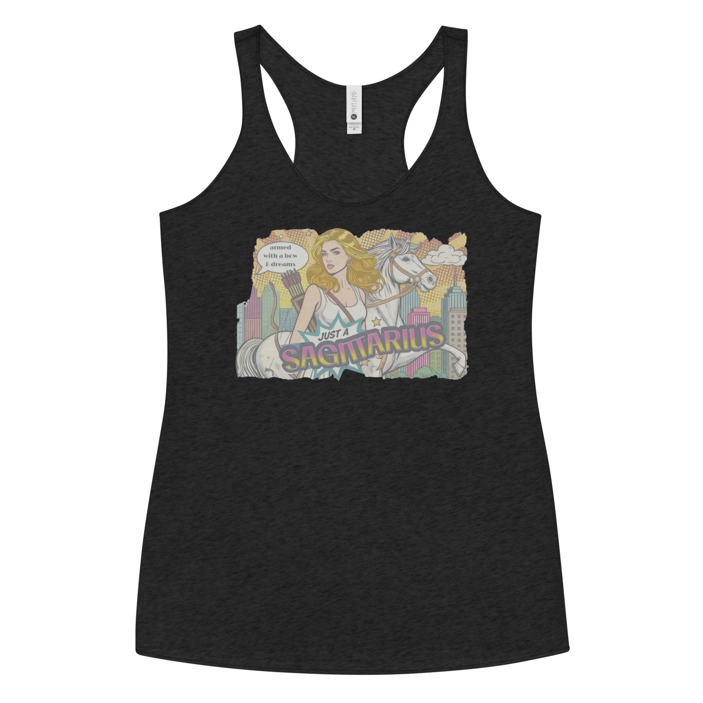 Flatlay of a heather black soft racerback tank t-shirt with a retro pop-art blonde Sagittarius graphic featuring a blonde woman, with bow & arrows, white stallion, and a city backdrop, captioned ‘Just a Sagittarius, armed with a bow & dreams'