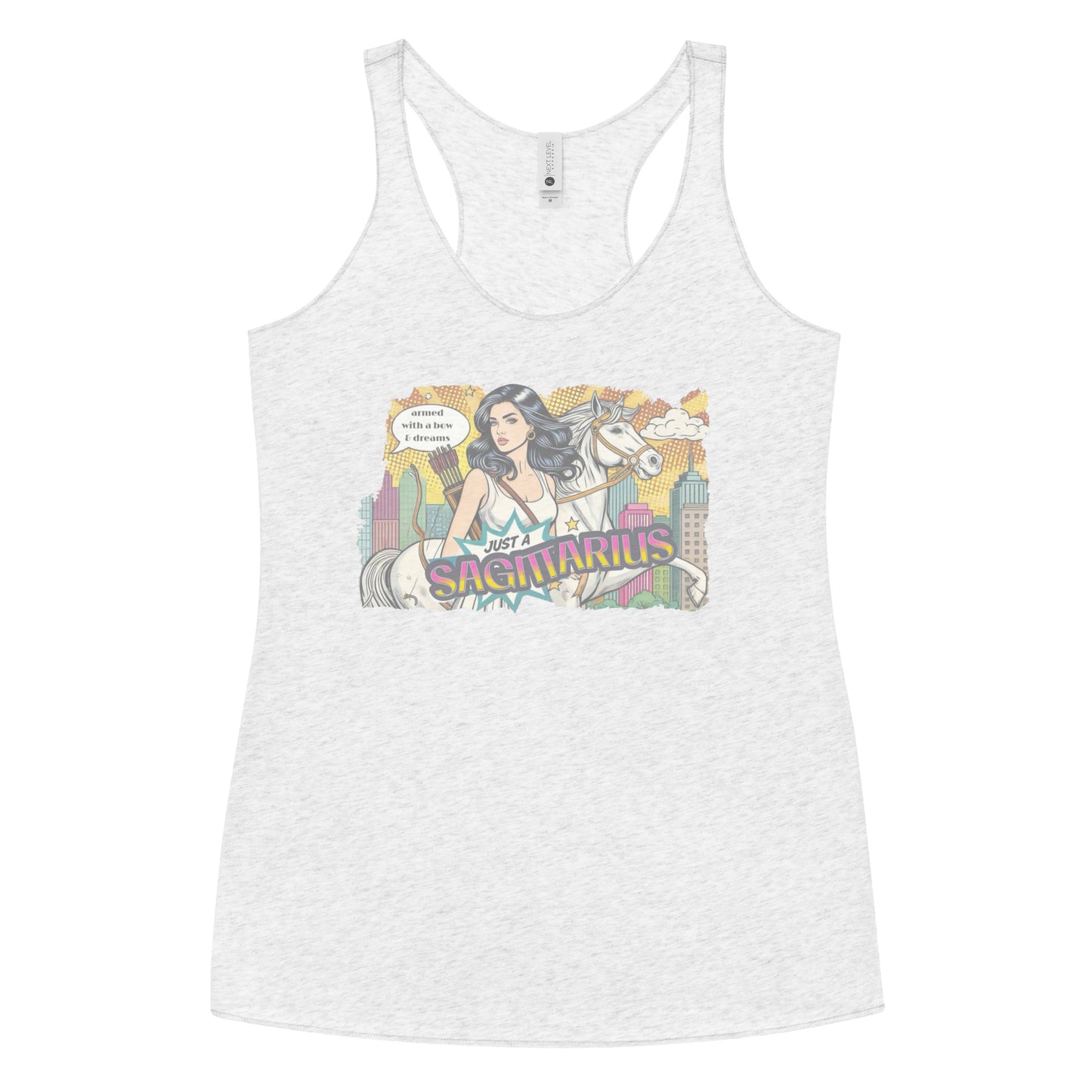 Flatlay of a heather white soft racerback tank t-shirt with a retro pop-art Sagittarius graphic featuring a black haired woman, with bow & arrows, white stallion, and a city backdrop, captioned ‘Just a Sagittarius, armed with a bow & dreams'
