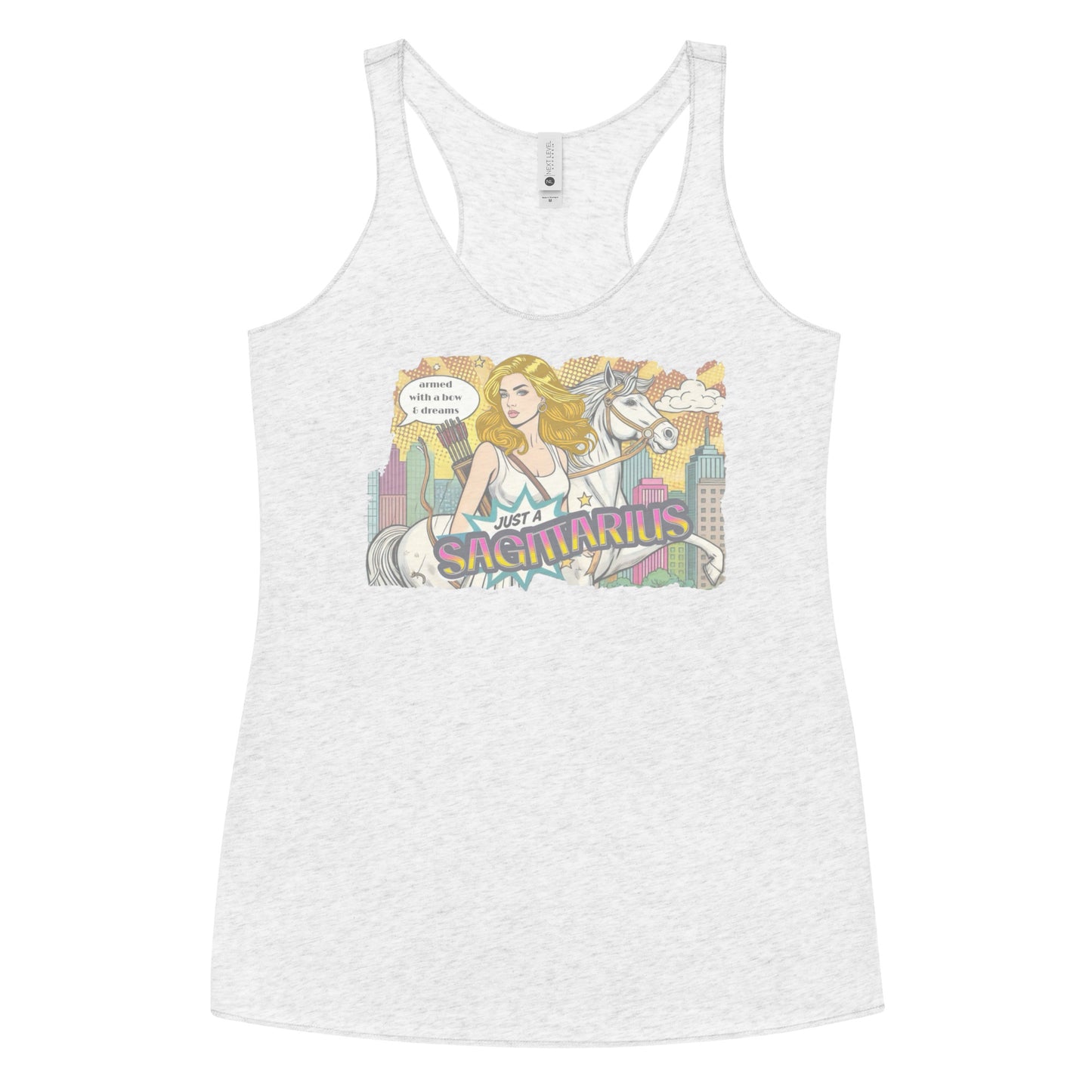 Flatlay of a heather white soft racerback tank t-shirt with a retro pop-art blonde Sagittarius graphic featuring a blonde woman, with bow & arrows, white stallion, and a city backdrop, captioned ‘Just a Sagittarius, armed with a bow & dreams'
